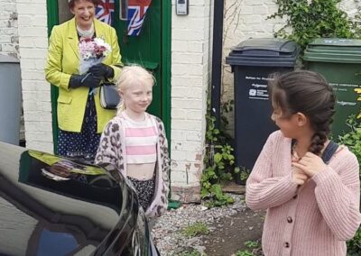 Children meeting the Combwich Queen