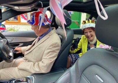 The Combwich queen in a car